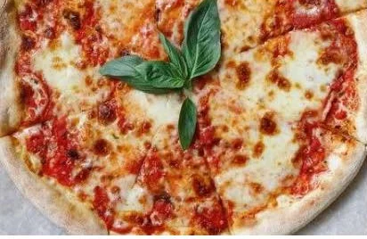 A Dario's Roman-style Margherita with fresh basil