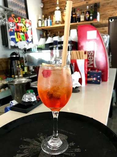An Aperol spritz on the bar at Dario's